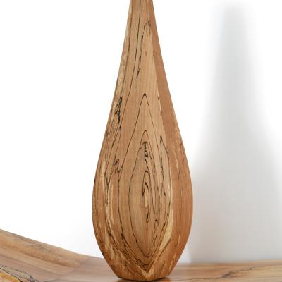 Solo Eaglet on sculpted eagle wing